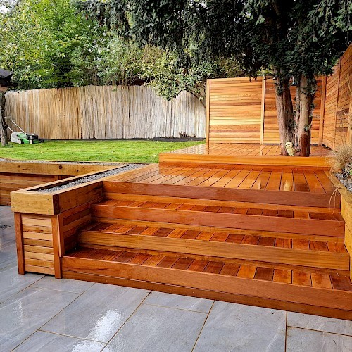 Steps and raised bed to decking area using Balau hardwood timber.