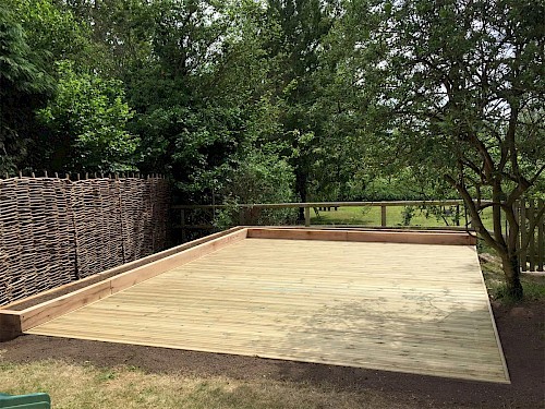 Decking area with raised sleepers
